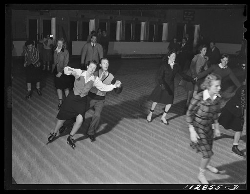Chevy Chase Ice Palace, Washington. D.C. Couple doing fancy ice skating