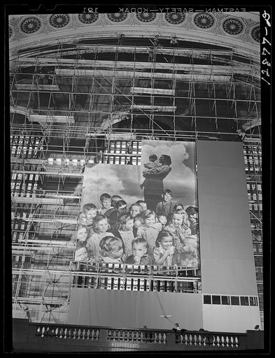 Installation of war bond mural. Grand Central Station, New York, New York