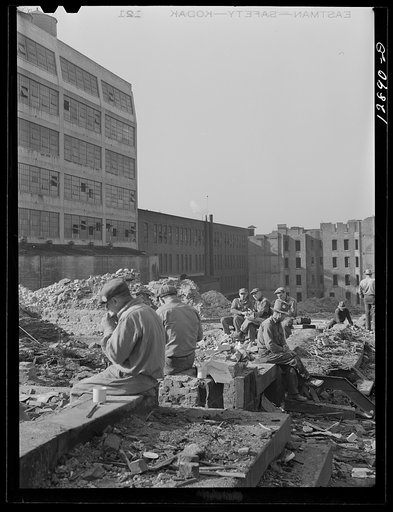 New York, New York. Employees of a wrecking company eating lunch