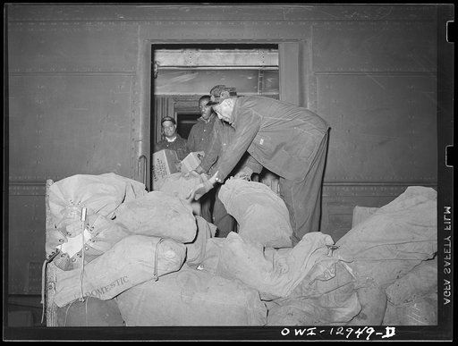 Washington, D.C. Unloading mail from a mail car