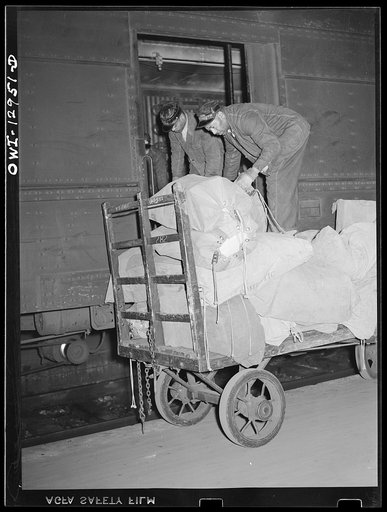 Washington, D.C. Unloading mail from a mail car