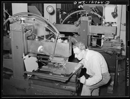 Washington, D.C. Siderographer transferring stamp image from the die to the plate at the United States Bureau of Engraving and Printing