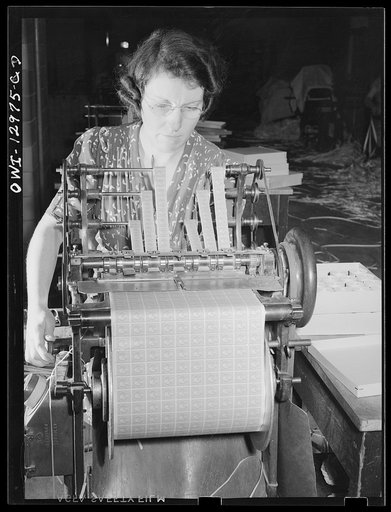 Washington, D.C. Postage stamp coiling machine at the United States Bureau of Engraving and Printing