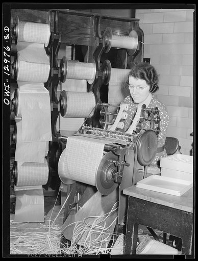 Washington, D.C. Stamp coiling machine at the United States Bureau of Engraving and Printing