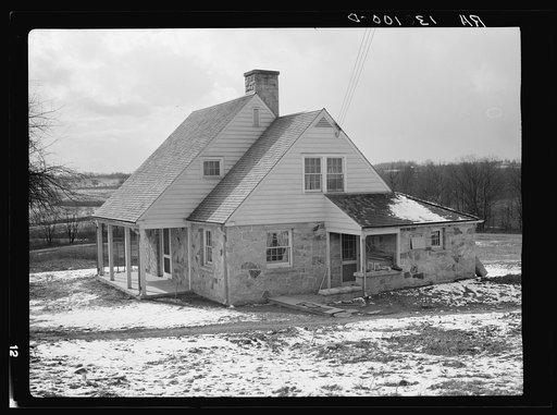One of the third group of houses constructed by the Resettlement Administration at the Arthurdale project. Reedsville, West Virginia