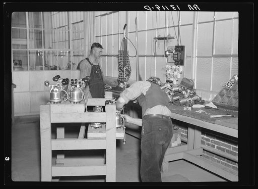 Workers in the vacuum cleaner factory at Reedsville, West Virginia