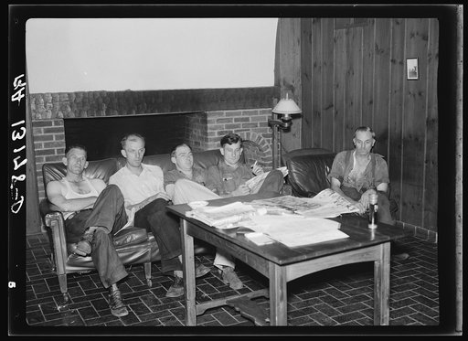 Truck drivers resting in lounge at Amity Hall, Pennsylvania. Truckers' facilities at Amity Hall are, according to the drivers, model accomodations and of a kind not found elsewhere