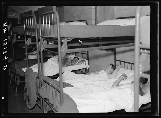 Sleeping quarters for truckmen at Amity Hall, Pennsylvania. An attendant awakens the men at any hour of the day or night required by their schedule