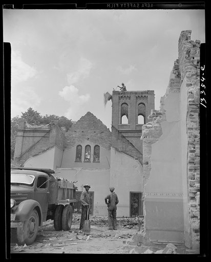 Washington, D.C. Loading debris from wrecked buildings on Independence Avenue