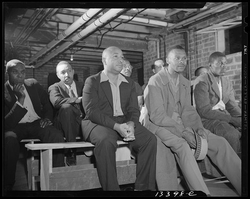 Washington, D.C. Air raid wardens' meeting in zone nine, Southwest area. Air raid wardens attending a meeting in their headquarters