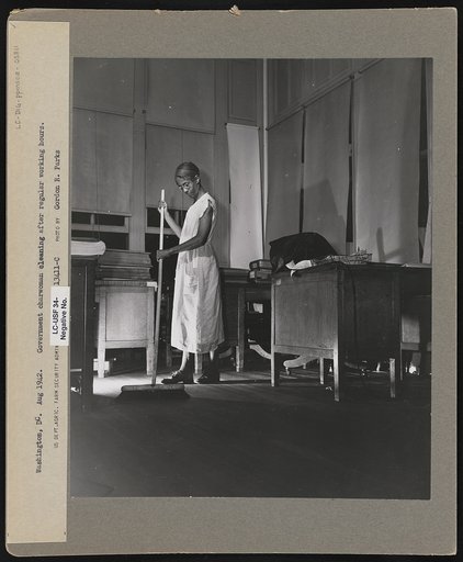 Washington, D.C. Government charwoman cleaning after regular working hours