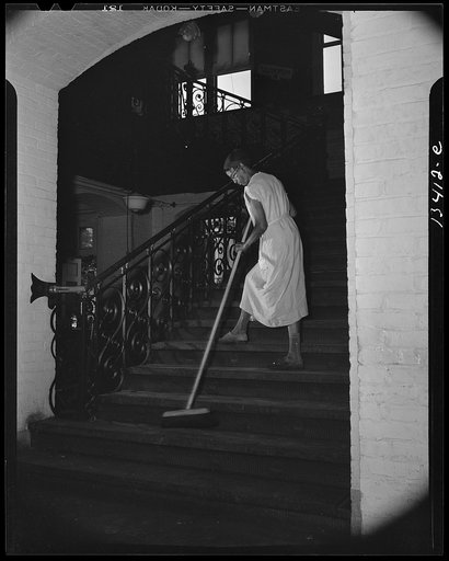 Washington, D.C. Government charwoman cleaning after regular working hours