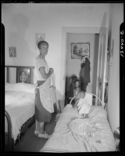 Washington, D.C. Grandchild of Mrs. Ella Watson, a government charwoman, taking her afternoon nap