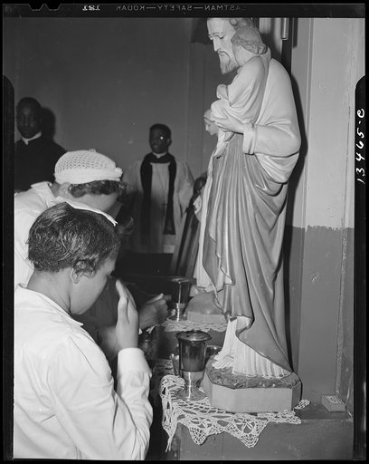 Washington, D.C. Worshippers before the altar in the St. Martin's Spiritual Church