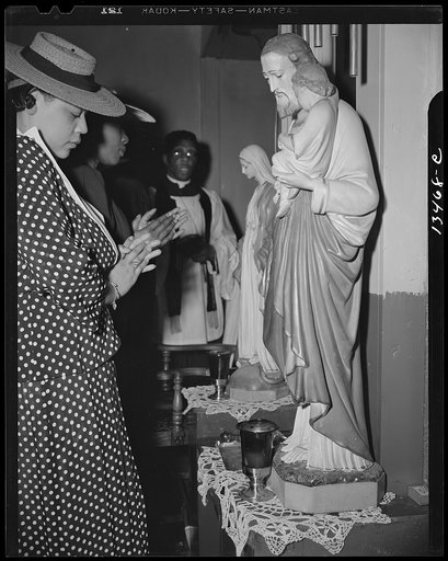 Washington, D.C. Worshipper before the altar of the St. Martin's Spiritual Church