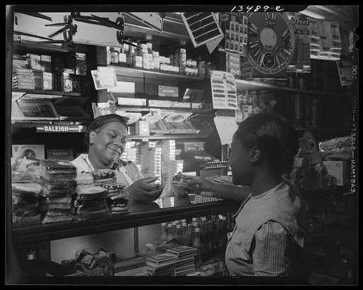 Washington, D.C. Clerk waiting on a customer in the store owned by Mr. J. Benjamin