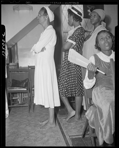Washington, D.C. As in Moses' time, members of the St. Martins Spiritual Church remove their shoes during the annual "flower bowl demonstration" because during this service they walk on holy ground