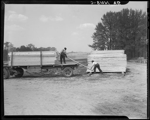 Unloading lumber at Berwyn, Maryland