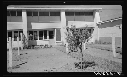 Backyard view of community building. Adobe construction. Chandler tract, Arizona