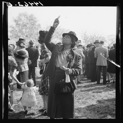 Negro woman watching the Queen of the Cherry Blossom Festival being crowned. Washington, D.C.