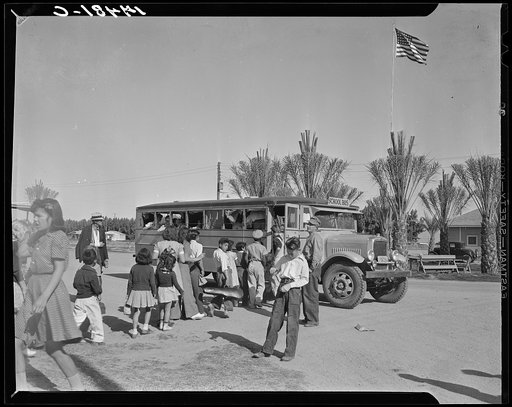 At the farmworkers' community at Indio, California, the newly-acquired school bus picks up one of its three loads of fifty children