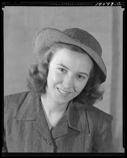 Washington, D.C. Modeling denim dress and hat worked out for a high school girl on a low income by graduate students of the Deptartment of Clothing and Textiles, School of Home Economics, University of Alabama
