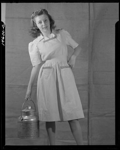 Washington, D.C. Modeling osnaburg pinafore worked out for a high school girl on a low income by graduate students of the Department of Clothing and Textiles, School of Home Economics, University of Alabama. Total cost of materials was fifty-seven cents