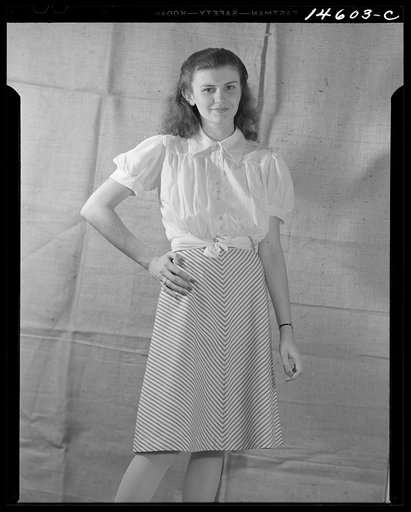 Washington, D.C. Modeling skirt and blouse worked out for a high school girl on a low income by graduate students of the Department of Clothing and Textiles, School of Home Economics, University of Alabama. The skirt is made of mattress ticking