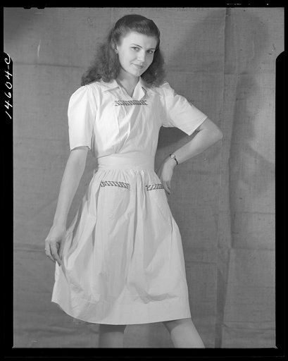 Washington, D.C. Modeling osnaburg pinafore worked out for a high school girl on a low income by graduate students of the Department of Clothing and Textiles, School of Home Economics, University of Alabama. Total cost of materials was fifty-seven cents