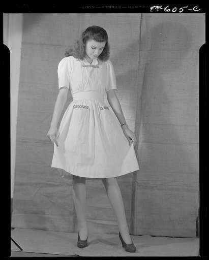 Washington, D.C. Modeling osnaburg pinafore worked out for a high school girl on a low income by graduate students of the Department of Clothing and Textiles, School of Home Economics, University of Alabama. Total cost of materials was fifty-seven cents