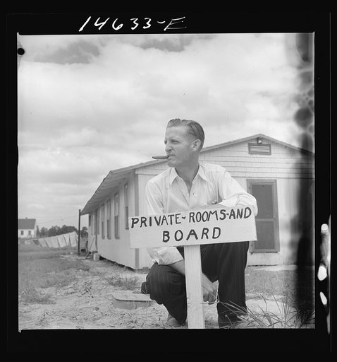 Four months after R.E. Centers was telling about how he was going to clear one hundred and seventy-five dollars a week from his rooming house, he had a sign posted in front of the "R.E. Claf" hotel reading "Private Room and Board." Childersburg, Alabama. Centers is superintendent of carpenters
