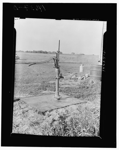 Milaca, Minnesota. Water pump installed to eliminate well pit