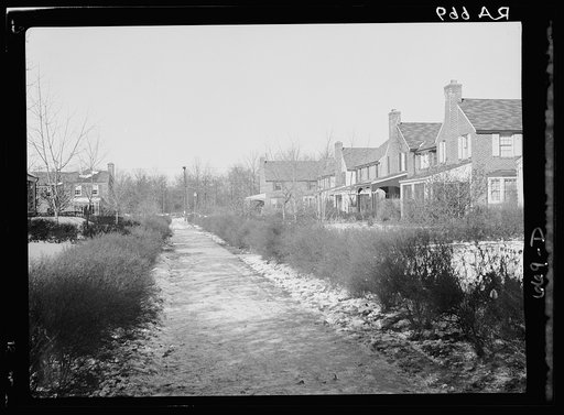 Untitled photo, possibly related to: Radburn, New Jersey, a privately financed model town which furnished some of the ideas for the Suburban Resettlement Administration's Greenbelt towns. Houses showing the plan by which thoroughfares are eliminated from the front of the houses