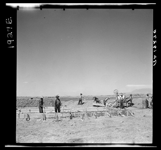 Untitled photo, possibly related to: Laying the foundations for one of the adobe houses. Bosque Farms, New Mexico