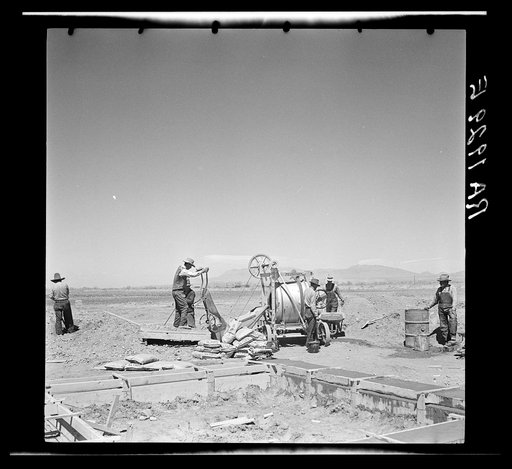 Untitled photo, possibly related to: Laying the foundations for one of the adobe houses. Bosque Farms, New Mexico