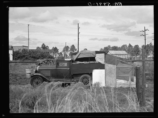 Untitled photo, possibly related to: The home of a migrant family camped near a citrus packing plant in Winterhaven, Florida