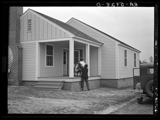 Untitled photo, possibly related to: The Howard family moving into their new home at Gardendale, Alabama
