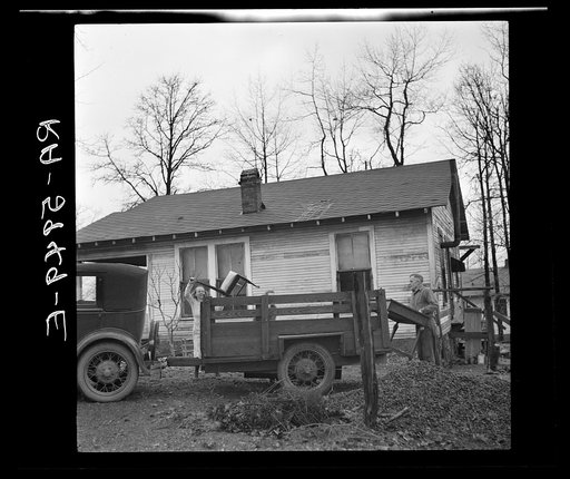 Untitled photo, possibly related to: The Eargle Family moving their household goods out of their home at Fairfield, Alabama. They will become homesteaders at Gardendale, Alabama