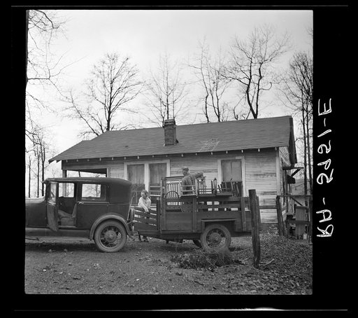 Untitled photo, possibly related to: The Eargle Family moving their household goods out of their home at Fairfield, Alabama. They will become homesteaders at Gardendale, Alabama