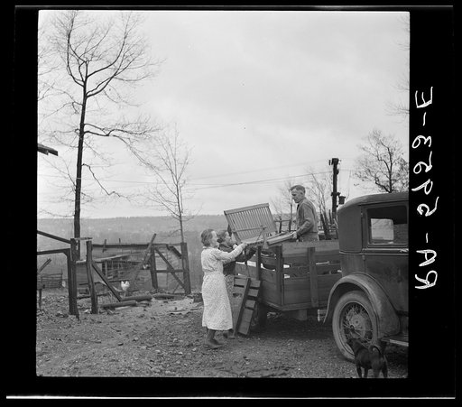 Untitled photo, possibly related to: The Eargle Family moving their household goods out of their home at Fairfield, Alabama. They will become homesteaders at Gardendale, Alabama