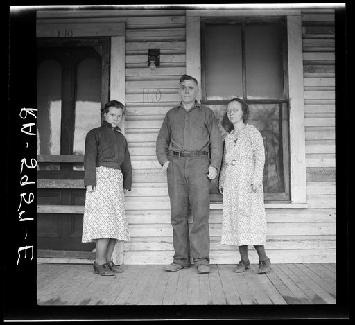 Untitled photo, possibly related to: The Eargle Family moving their household goods out of their home at Fairfield, Alabama. They will become homesteaders at Gardendale, Alabama