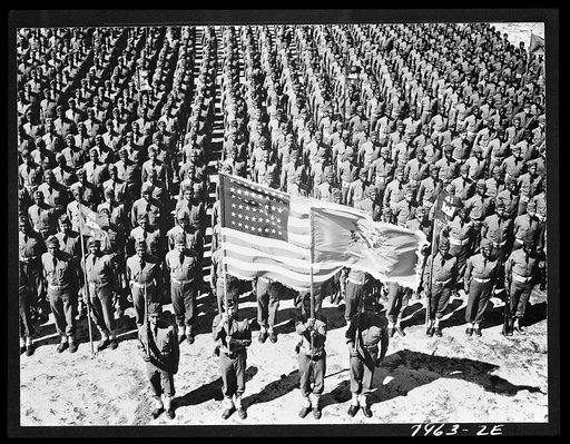 Untitled photo, possibly related to: Fort Bragg, North Carolina. 41st Engineers on parade with Sergeant Franklin Williams in color guard