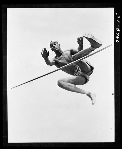Untitled photo shows: Cornelius Johnson, winner of the gold medal at the 1936 Olympics, in a high jump 