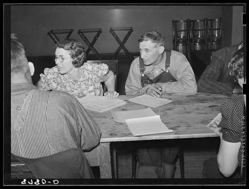 Untitled photo, possibly related to: Rehabilitation clients working out farm and home plans at group meeting. York, Nebraska