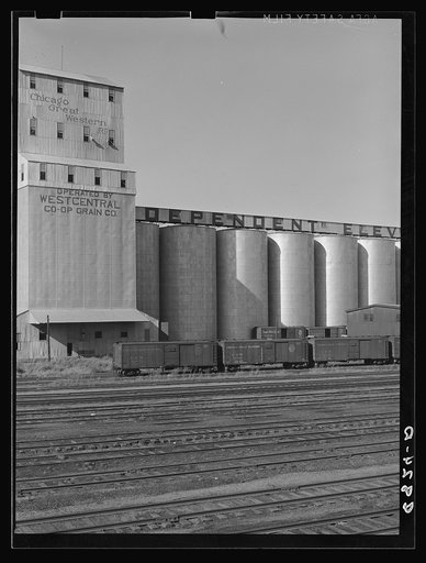 Untitled photo, possibly related to: Grain elevators along railroad tracks. Omaha, Nebraska