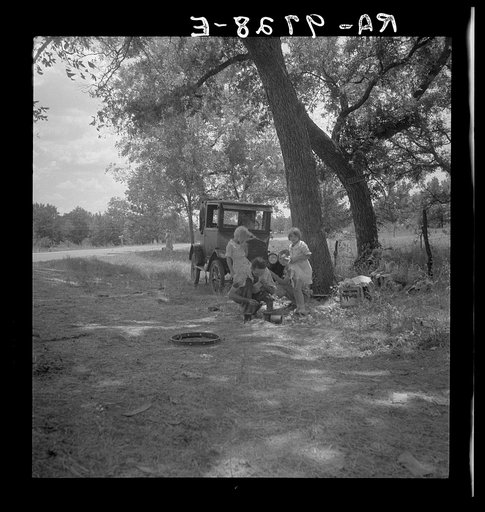 Untitled photo, possibly related to: Migrant family from Oklahoma in Texas. A family of six alongside the road. An example of how they fall between the relief agencies. The father, aged thirty-five, is an intelligent fellow, a painter by trade. Advanced tuberculosis, victim of an occupational diseas