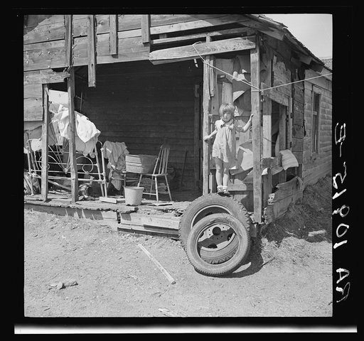 Untitled photo, possibly related to: Back porch on a washday. Gibbs City, Michigan