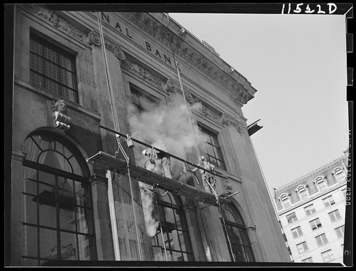 Untitled photo, possibly related to: Washington, D.C. Steam cleaning a bank building at 14th and G Streets, N.W.