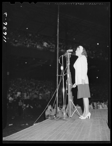 Untitled photo, possibly related to: Washington, D.C. Donald Nelson of the War Production Board speaking at the scrap salvage rally in Griffith Stadium