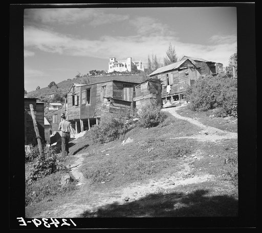 Untitled photo, possibly related to: Villa of the owner of a sugar plantation and refinery and sugar workers' shacks. Ponce, Puerto Rico